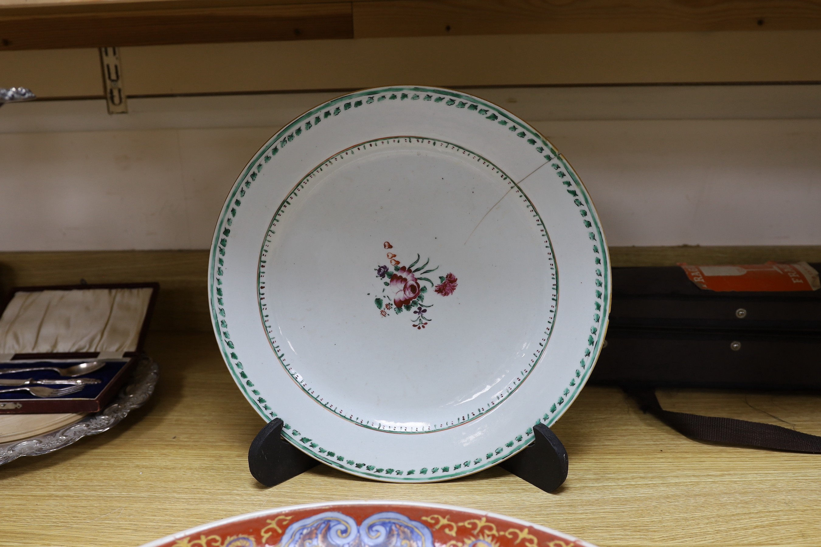 A large Chinese Export plate and a later figural dish, 48cms diameter